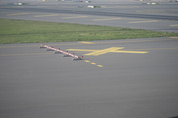 Markings on an airport runway guide aircraft movements
