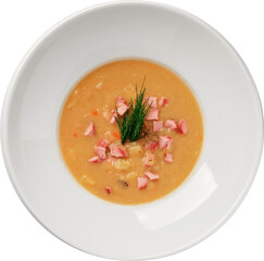Close-up of a flavorful split pea soup with ham and fresh dill in a white bowl.