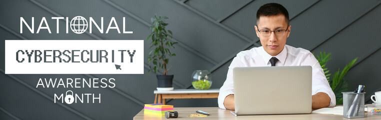 Asian businessman working on laptop in office