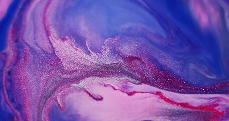 Liquid marble texture. Ripple fluid. Defocused blue purple red color ink in acrylic water crimson flow floating on abstract background.