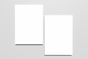 White A4 paper, magazine, or business card mockups floating diagonally with soft shadows isolated on grey background.