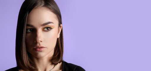 Beautiful young woman with short brown hair on color background with space for text