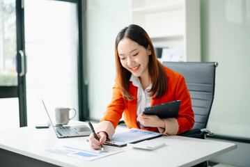  businesswoman checking time feeling motivated waiting for leaving office do on their tablet,...