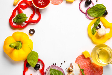 Frame made of ingredients for preparing pizza on white background