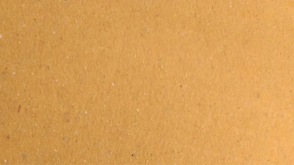 Background of brown kraft paper or cardboard texture. Abstract pattern of beige rough carton, old paper sheet, parchment or papyrus surface.
