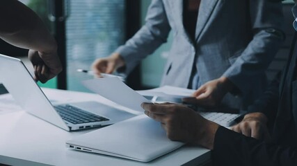 Accounting company provide finance and taxation planning for profitable cash flow, Auditor and accountant team working in office, analyze financial data and accounting record with calculator.Insight - Powered by Adobe