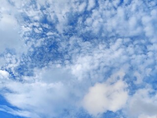 sunny day with blue sky with white clouds