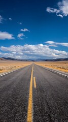 Fototapeta premium High quality photo of long Desert Road Stretching to the Horizon Under a Clear Blue Sky.