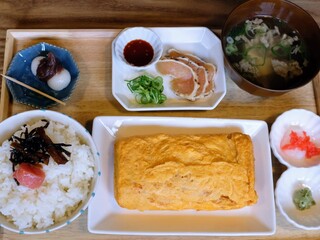 Kyoto, Japan – March 29, 2024: Traditional Japanese breakfast with omelets, raw chicken, cod roe,...