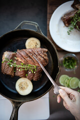 Delicious Braised Short Ribs with Roasted Vegetables in Cast Iron Skillet