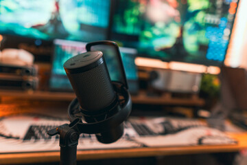 Modern podcast setup with professional microphone on boom arm in cozy home studio, featuring blurred monitors and wooden blinds background. Creative workspace inspiration.