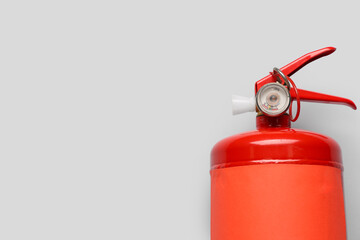 Fire extinguisher on grey background
