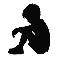 Melancholy Young Boy Silhouette Sitting Alone - Sadness and Solitude Concept