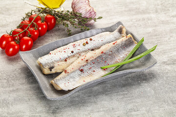 Marinated herring fillet with green onion
