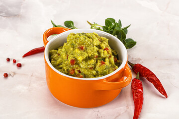 Guacamole with avocado, tomato and chili