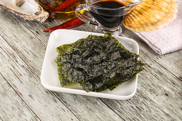 Green nori seaweed chips with soya sauce