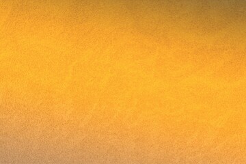 Abstract golden yellow textured surface is covering entire frame in flat design, subtly speckled