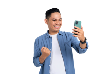 Yes, Great news. Excited young Asian man in casual shirt using smartphone, making winning gesture, celebrating success isolated on transparent background