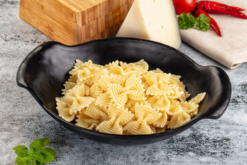 Italian pasta Farfalle with oil