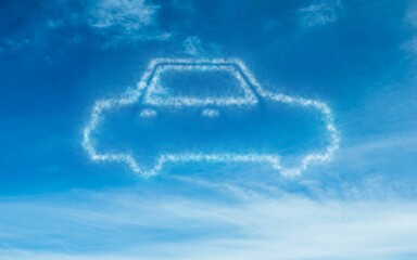 Stylized car-shaped cloud is forming in flat design blue sky with wispy cirrus streaks