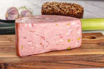 Italian Mortadella pork sausage piece