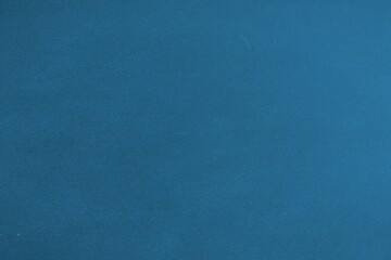 Blue textured surface is being displayed in flat illustration, showcasing subtle tonal shifts