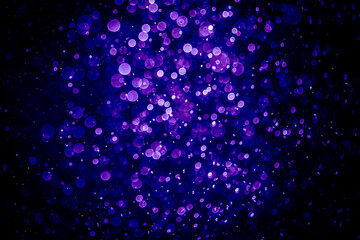 Blurred photo with purple violet and blue dots visible glittering, shining brightly look and feel luxurious