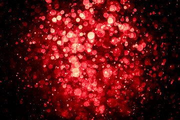 Blurred photo with red dots visible glittering, shining brightly look and feel luxurious