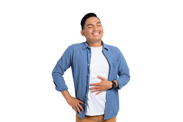 Portrait of young Asian man in casual shirt feeling happy after eating delicious food and rubbing his belly isolated on transparent background