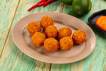 Fried crispy yellow cheese balls