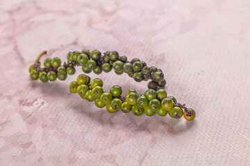 Ripe green pepper corn branch