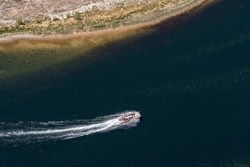 The Navajo Sandstone is a geological formation in the Glen Canyon Group, Horseshoe Bend is a...