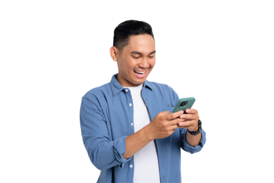 Happy young Asian man in casual shirt using smartphone for messaging with a friend isolated on transparent background - Powered by Adobe