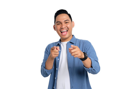 Hey, you. Cheerful young Asian man in casual shirt pointing index finger at camera, making happy choice isolated on transparent background