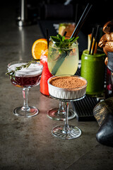 Tasty drinks and desserts on a colorful bar counter, capturing the festive vibe