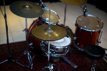 Close-Up of Drum Set with Microphones in Recording Studio