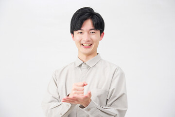 男性　20代　ひらめく　白背景