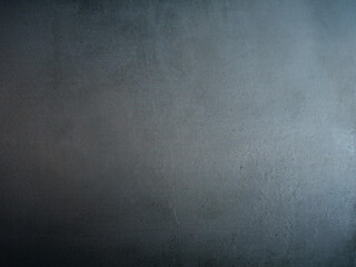 Elegant blue grey concrete wall clean background. Rough scratchy matte grungy  texture backdrop. Noisy grainy cement surface. Shadowed. Scratches, scuffs. Copy space for text. Brushed metal plate.