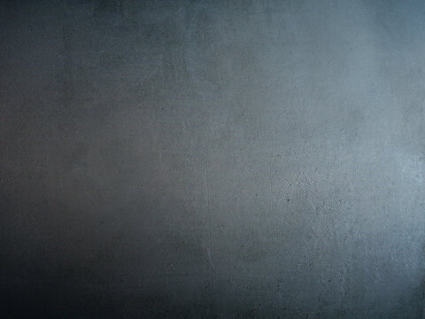 Elegant blue grey concrete wall clean background. Rough scratchy matte grungy  texture backdrop. Noisy grainy cement surface. Shadowed. Scratches, scuffs. Copy space for text. Brushed metal plate. - Powered by Adobe