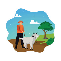 A farmer leads goats in the meadow.