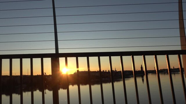Stockholm, Sweden A bicycle ride at sunrise over the Western Bridge, or Vasterbron. 