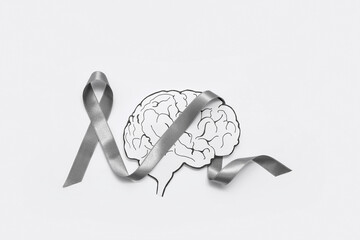 Paper brain with grey awareness ribbon on white background. Cancer concept