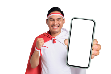 Excited young Asian man celebrate Indonesian independence day on 17 August while holding smartphone with blank screen isolated on transparent background