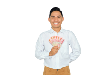 Finance concept. Smiling young Asian man in formal wear holding money and looking at camera with happy expression isolated on transparent background