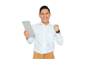 Portrait of excited young Asian man in formal wear holding digital tablet and celebrating success, raising fist isolated on transparent background