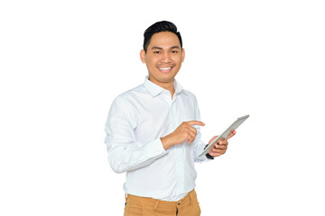 Portrait of happy young Asian man in formal wear holding digital tablet and looking at camera with smiling face isolated on transparent background
