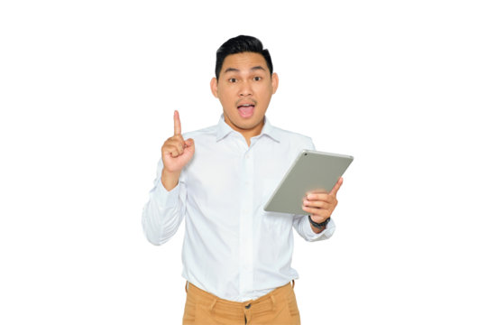 Portrait of excited young Asian man in formal wear pointing finger up getting idea after reading article on tablet isolated on transparent background