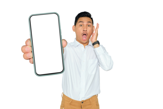 Mockup, Mobile App concept. Shocked young Asian man in formal wear showing mobile phone with blank white screen isolated on transparent background - Powered by Adobe