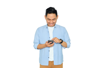 Happy young Asian man in casual clothes using mobile phone for texting message or checking social media isolated on transparent background