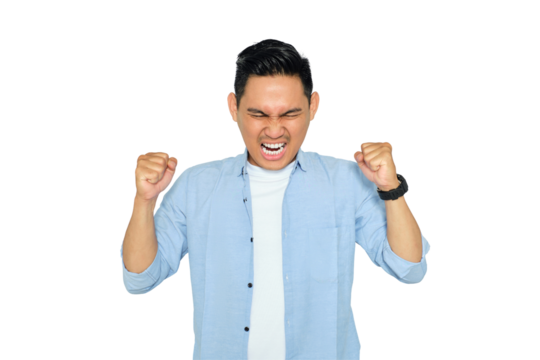 Portrait of angry young Asian man in casual clothes raising hands and screaming with aggressive expression isolated on transparent background